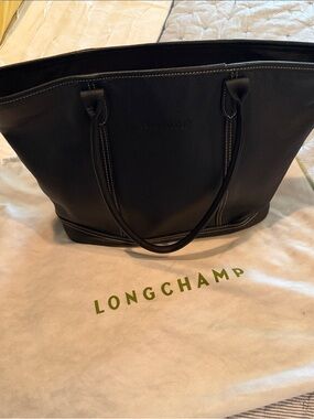 Longchamp Black Tote with White Contrast Stitching and bold red interior